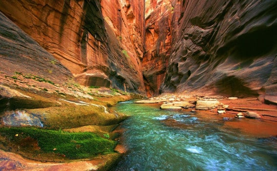 Water flowing through the Narrows. What is the best time of year to hike these narrow canyons?