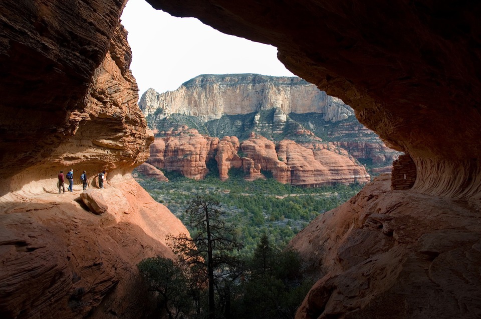 People hiking in a canyon in sedona