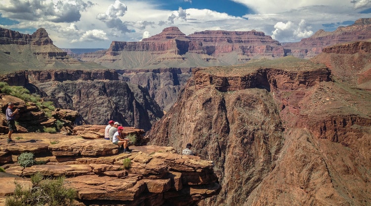 People on edge of Grand Canyon